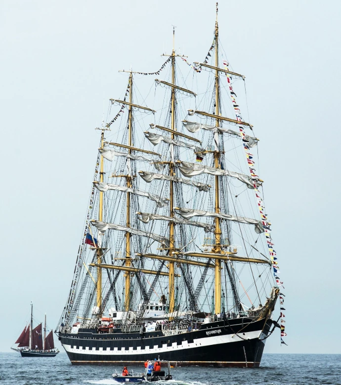 white and brown boat